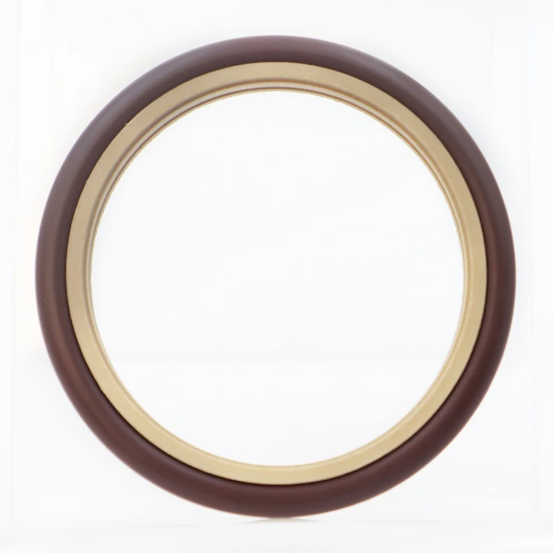 Labyrint-typ sammansatt tätning för roterande axlar